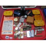 Lighters, coinage, Acme whistles, small boxes, badges, watch, etc:- One Tray.