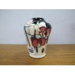 A Moorcroft Pottery Vase, painted with the 'Wild Cyclamen' design by Emma Bossons, impressed and