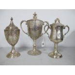 A Walker & Hall Plated Twin Handled Lidded Pedestal Trophy Cup, inscribed "R.A.O.B. G.L.E.