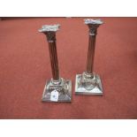 A Matched Pair of Corinthian Column Plated Candlesticks, each with removable nozzle, on spreading