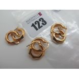 Three Pairs of Modern Hoop Earrings, (stamped "375" (3.8grams). (3)