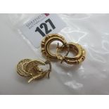 A Pair of Modern Earrings, stamped "375"; together with a smaller pair of earrings, stamped "14k".