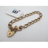 A 9ct Gold Curb Link Bracelet, to 9ct gold heart shape padlock style clasp (overall weight 20grams).