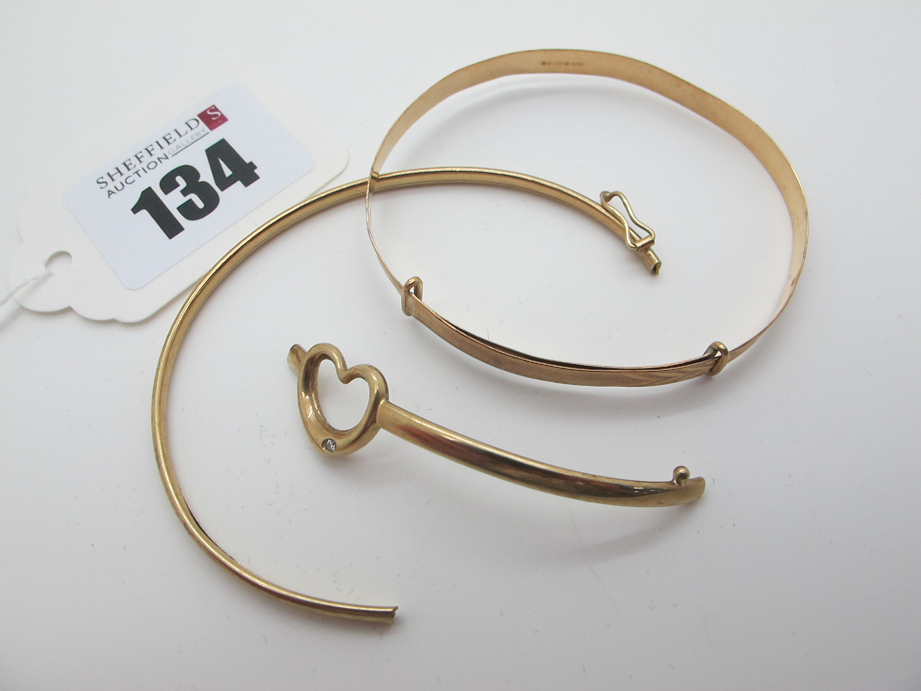 A 9ct Gold Expanding Bangle, together with another bangle (damaged / incomplete). (2)