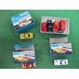 Three Minic Racing Cars, boxed, Ref No's M1576 (Ferrari), M1574 (Chevy Corvette) and M1587 (Ford