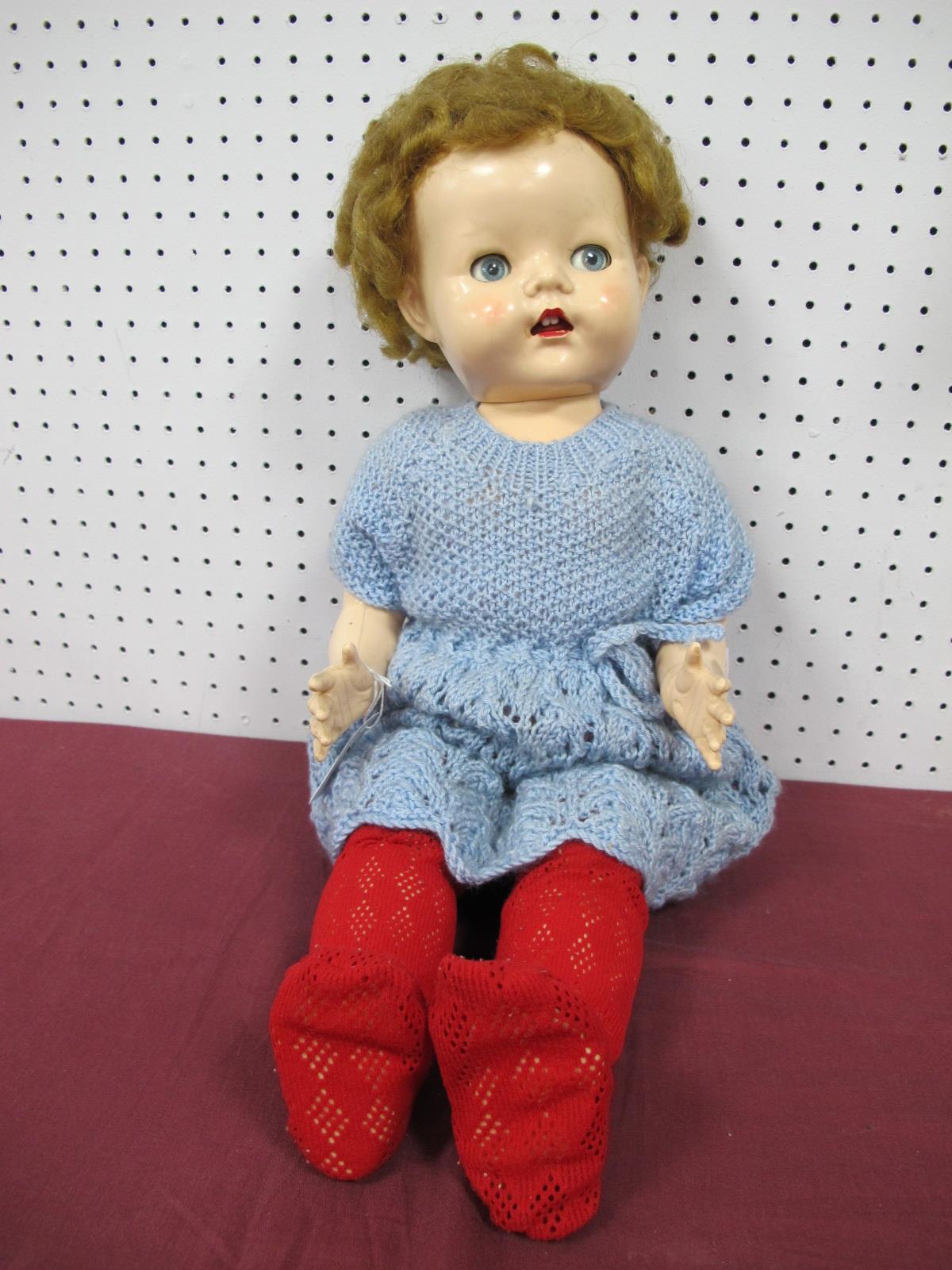 A Circa 1950's Hard Plastic Doll by Pedigree (England), measuring approximately 56cm tall.