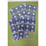 Collection of UK 50p's In Change Checker Cards, includes The Snowman, Beatrix Potter, The