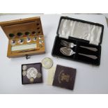 A Silver Christening Spoon and Fork, in case. Crowns, fourpences, boxed weights.