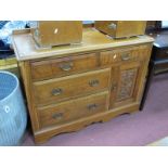 An Early XX Century Walnut Cabinet, with a low back, two short drawers, over cupboard door, two long