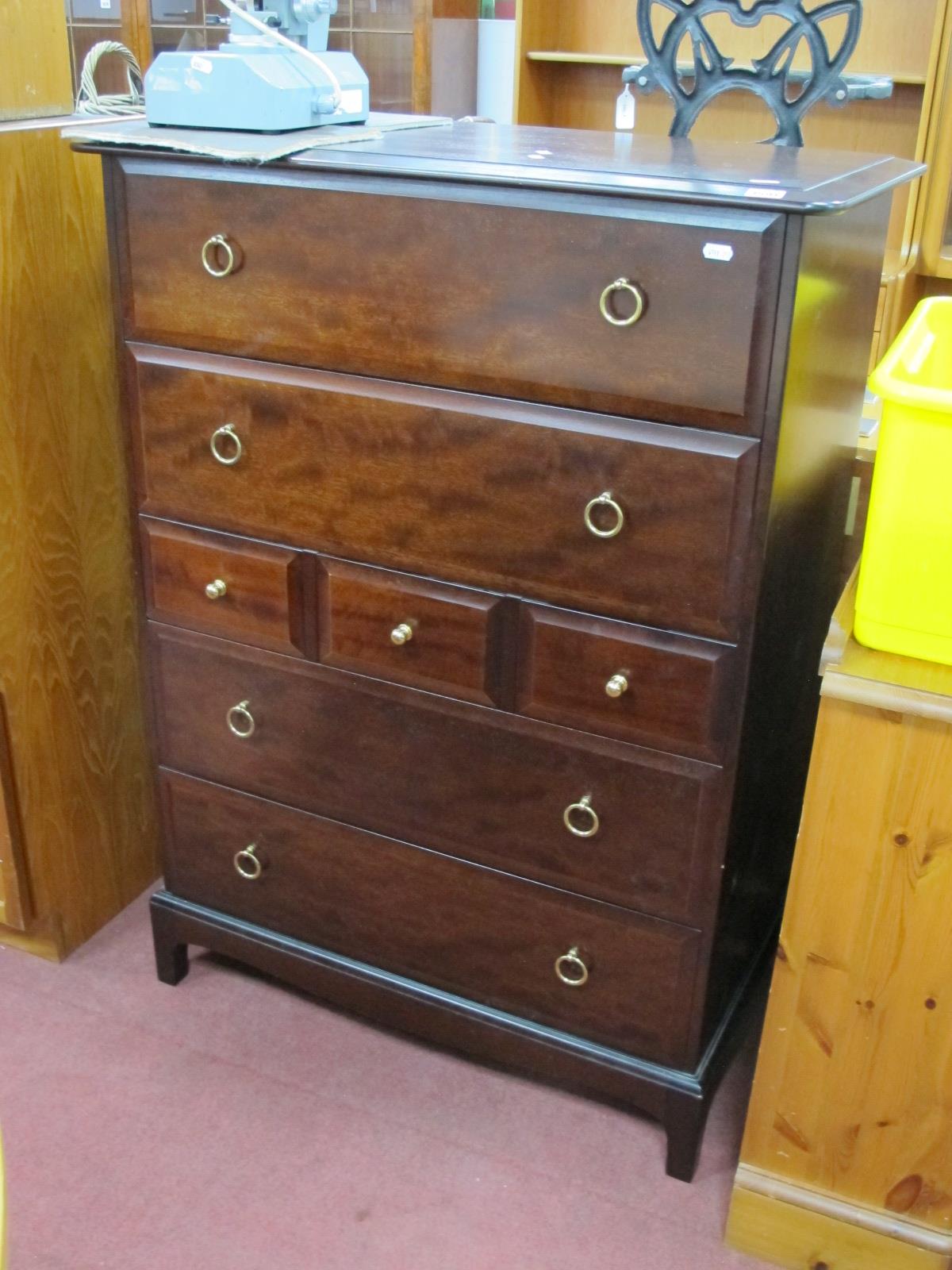 A Stag Mahogany Chest of Drawers, with seven drawers, shaped apron 82cm wide.