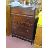 A Stag Mahogany Chest of Drawers, with seven drawers, shaped apron 82cm wide.