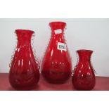 A Set of Three Mid XX Century Whitefriars Ruby Glass Vases, pattern No 9420, of waisted form with