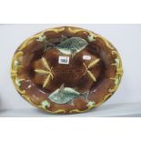 Majolica Bread Plate Circa 1900, featuring fish and wheat sheaf's, surrounding verse, within