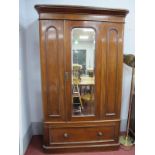 A XIX Century Mahogany Duchess Style Wardrobe, with mirror door and single drawers, 112cm wide.