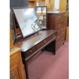 A Stag Mahogany Dressing Table, with three mirrors, three drawers on square legs,116cm together with