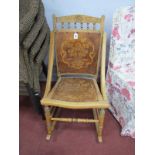 An Early XX Century Stripped Beech Rocking Chair, with floral decoration to seat and back.