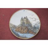 Mettlach Geschutz Pottery Charger, featuring castle upon rock scene within gilt border, numbered