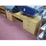 Light Wood Dressing Table, with a rectangular top, seven small drawers, on supports.