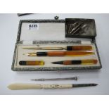 Art Deco Style Four Piece Desk Set, in ambered plastic white metal pencil, bone handled dip pen,