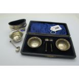 A Pair of Dainty Hallmarked Silver Salts, in a fitted case with a pair of dainty spoons; an oval