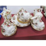 Royal Albert 'Celebration' Tea Ware of twenty one pieces, 'Old Country Roses' mantle clock.
