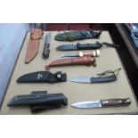 Buck Outdoor Knife, in sheath; J.L.T. knives Outdoor Knife, in sheath; Swedish type skinning knife