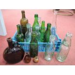 Approximately Fifteen Late XIX Century/ Early XX Century Green and Clear Storage Bottles,