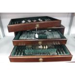 A Three Drawer Canteen Chest of Kings Pattern Plated Cutlery, twelve setting, fitted throughout,