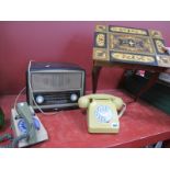 A Bush Bakelite Cased Radio, (chipped), Italian musical table, two telephones circa 1970's. (4).