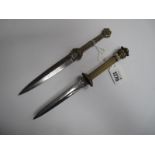 I.X.L. George Wostenholm Knife, double edged blade with etchings, brass handle with decoration, '
