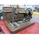 A Late XIX Century Singer Sewing Machine, (cased).