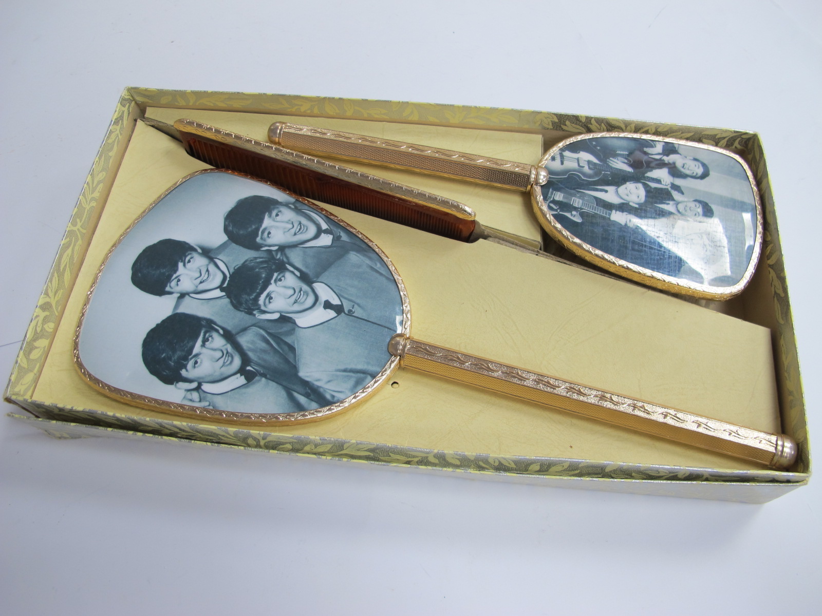 The Beatles, boxed dressing table set, featuring images of The Fab Four to the back of mirror and