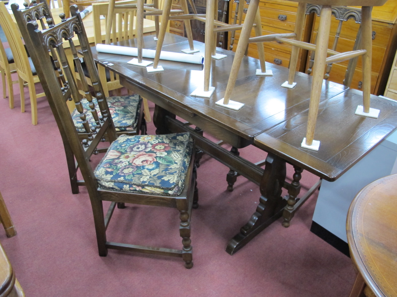 Ercol Dark Wood Draw Leaf Dining Table and Four Spindle Back Chairs.