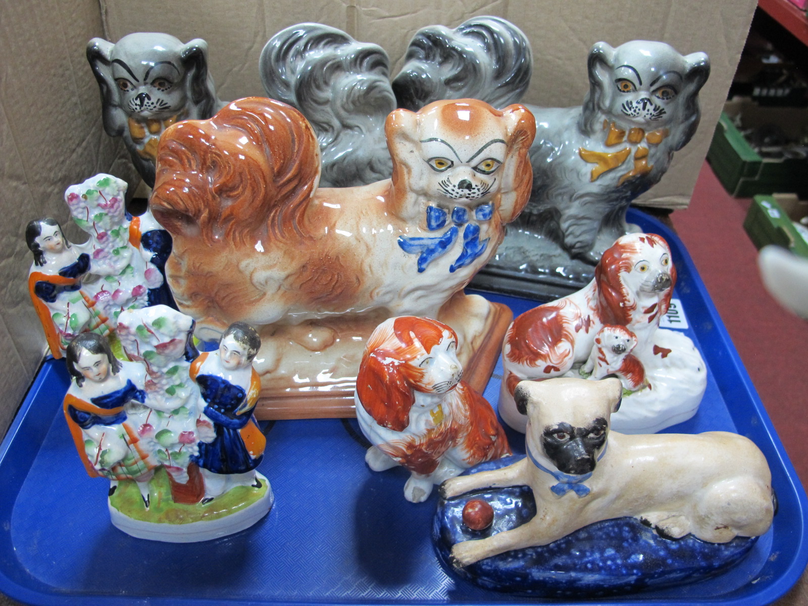 A Pair of XIX Century Staffordshire Pottery Scottish Figure Groups, 14cm high, similar dogs,