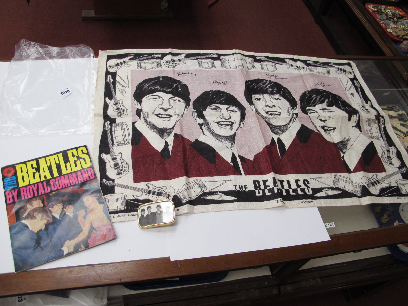 The Beatles, Irish pure linen tea towel, Royal Command booklet, and buckle.