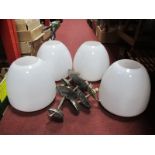 A Set of Four Vintage White Opaque Glass Ceiling Lights, of ovoid form, with fittings, 26cm wide.