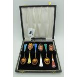 David Andersen; A Set of Six Norwegian Gilt and Harlequin Enamel Coffee Spoons, highlighted in