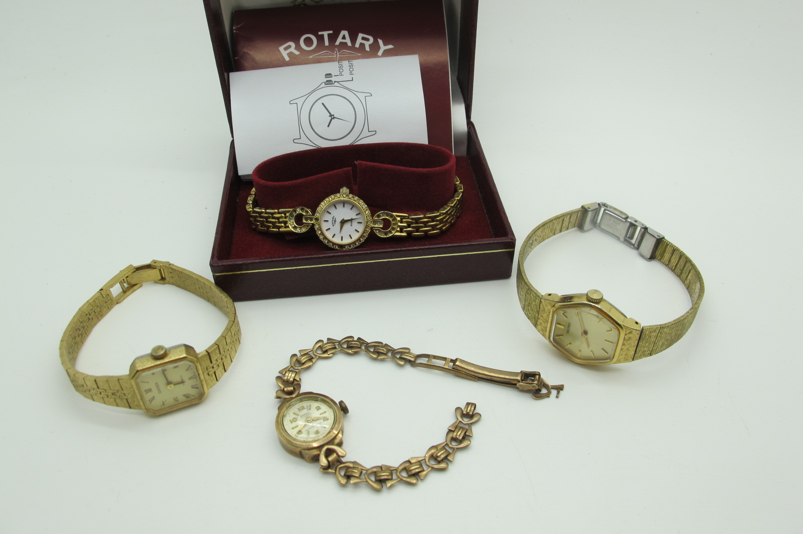 A 9ct Gold Ladies Wristwatch, the signed dial with Arabic numerals and line markers, to open work