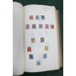 A Worldwide Collection of Stamps, early to modern, housed in an old ledger type binder, a good