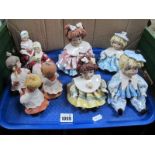 Three Lino Zampiva Doll Figures, another damaged, two Doulton and three Capodimonte examples:- One