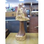 A Carved Wooden Toadstool, 66cm high.