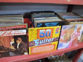 A Large Quantity of L.P's, in three boxes, with artists as diverse as Neil Diamond, Shirley