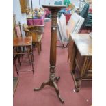 Mahogany Torchere, circa 1900, with circular dish top, carved and reeded support on tripod legs,