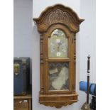 Sligh Oak Cased Wall Clock, with Westminster Chimes movement and glazed pendulum door, 46.5cm wide.