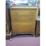An Edwardian Inlaid Mahogany Small Chest, of four drawers having brass handles (two absent), on