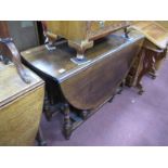 Titmarsh Goodwin Style Oak Gate Leg Table, with drop leaves on turned and block supports.