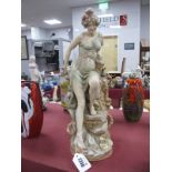 Continental Porcelain Figural Spill Vase, modelled as a Scantilly Clad Lady on rocky naturalistic