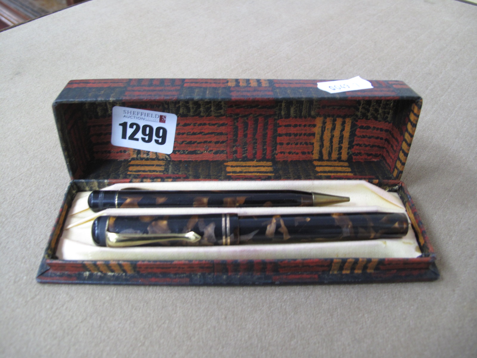 A Fountain Pen with 14ct First Quality Nib in marble effect case, with side filling lever, plus