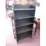 1920's Oak Bookcase, with beadwork fronts to fixed shelves, shaped gallery, 61cm wide.