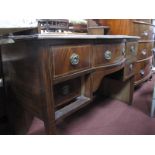 Edwardian Inlaid Mahogany Dressing Table, with bowed front, on tapering legs, 122cm wide.